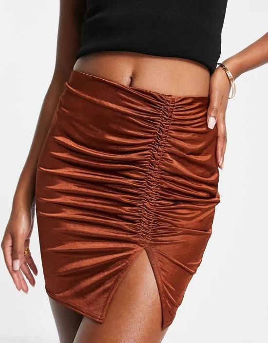ruched channel slinky mini skirt in chocolate