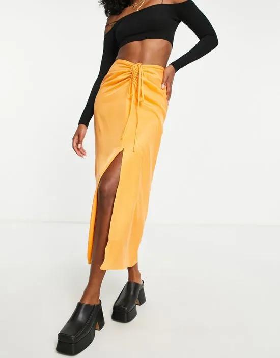 ruched channel waist midi skirt in orange