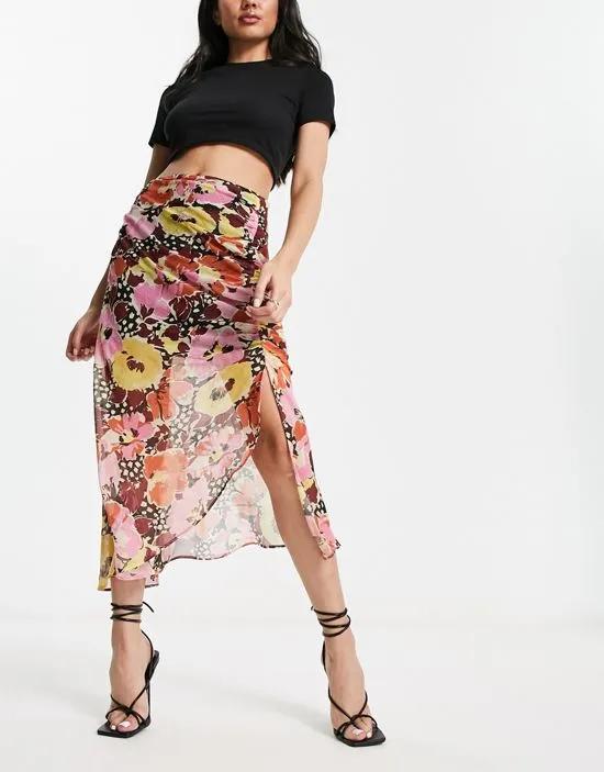 ruched chiffon midi skirt in orange floral