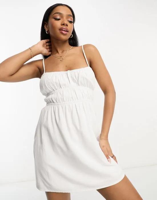 ruched detail strappy mini dress in white