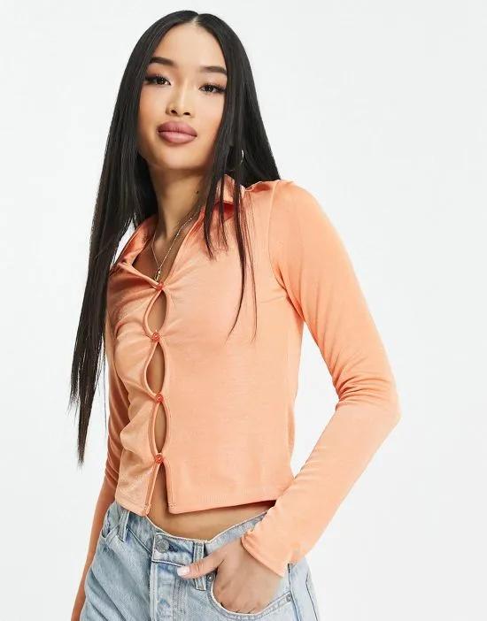 ruched front button through top in orange