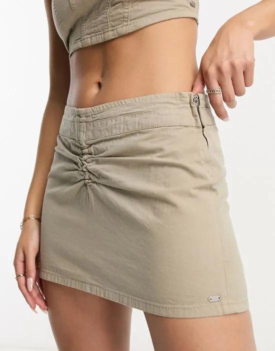 ruched front mini skirt in washed sand - part of a set