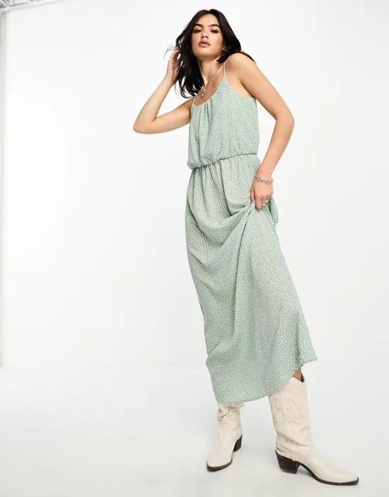ruched out maxi dress in green spot