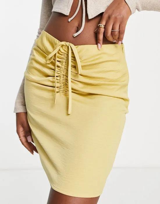 ruched strappy detail mini skirt in lemon