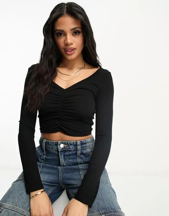 ruched v front and back crop top in black