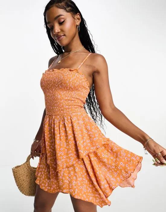 ruffle bandeau mini dress with floral print in orange