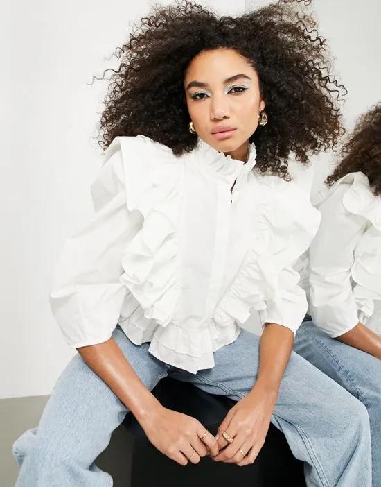 ruffle detail shirt with high neck in white