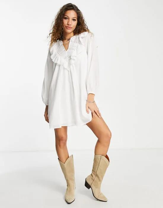 ruffle front smock dress in off white