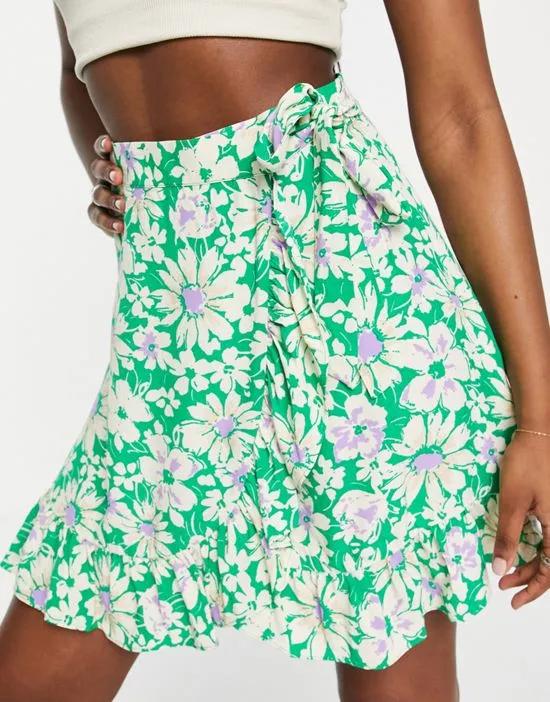ruffle wrap daisy print mini skirt in green