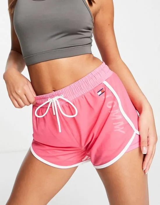 running shorts with power mesh overlay in pink