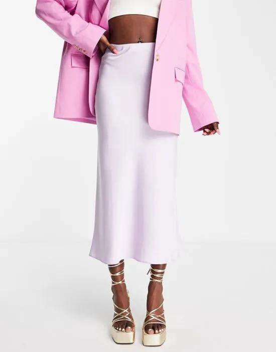 satin bias midi skirt in pastel lilac