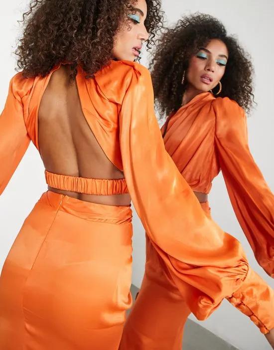 satin drape blouson sleeve top with open back in spicy orange