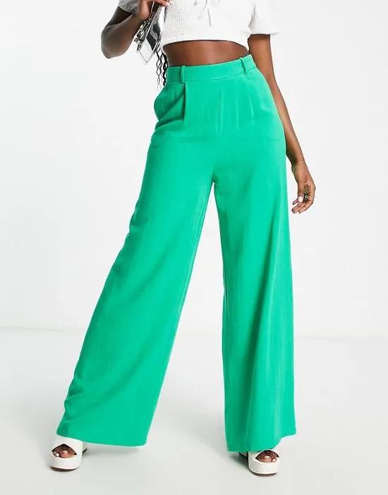 satin high waist wide leg pants in bold green - part of a set