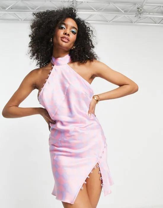 satin mini dress in checkerboard print with rouleaux loop detail