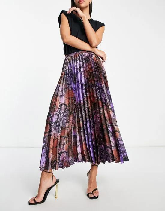 satin pleated midi skirt in purple snake print