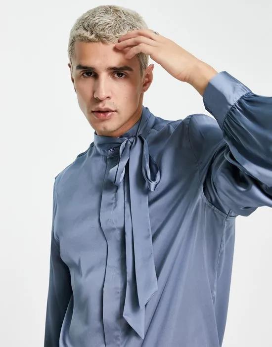 satin shirt with tie neck and blouson volume sleeve in blue
