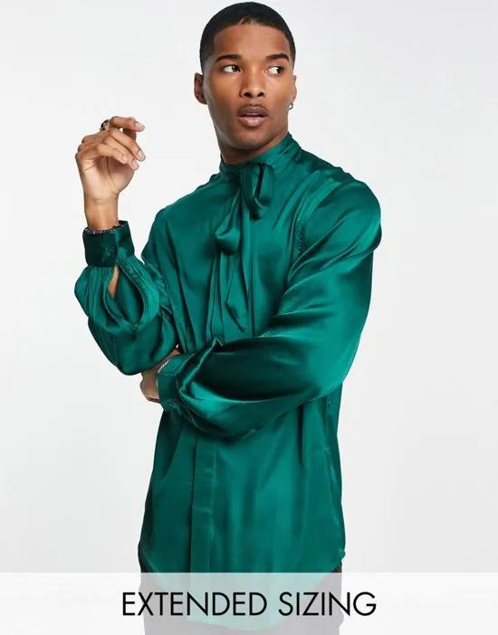 satin shirt with tie neck and blouson volume sleeve in jewel green