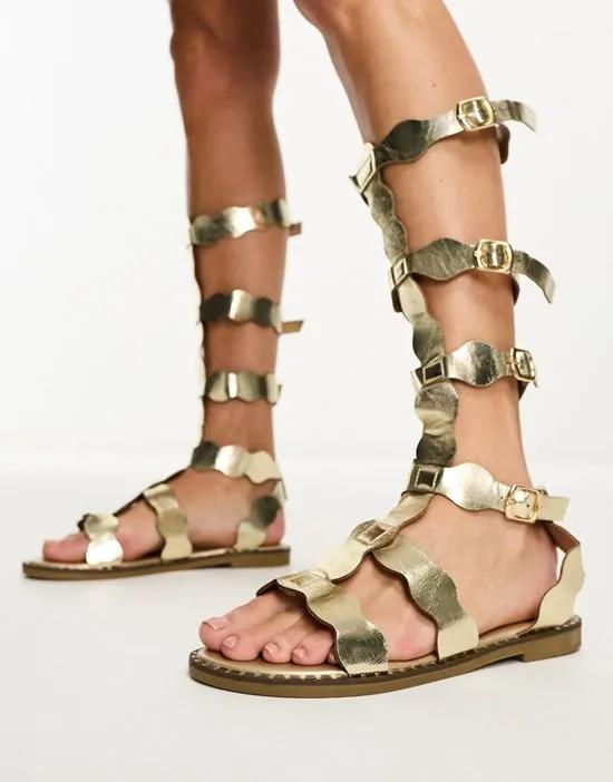 scallop edge gladiator sandal in gold