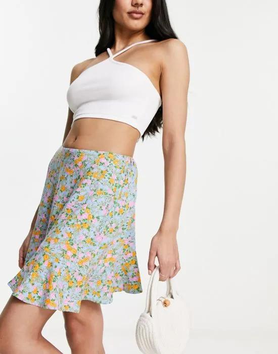 seam detail mini skirt in blue ditsy floral