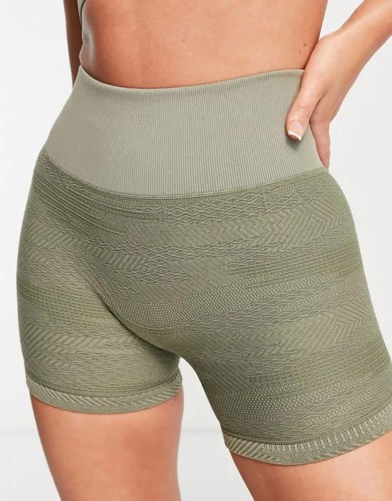 seamless booty shorts in textured camo in khaki