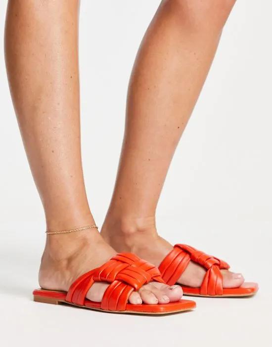 Sebra leather flat sandals in bright orange
