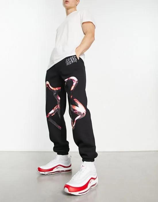 seekers jersey sweatpants in black with graphic print