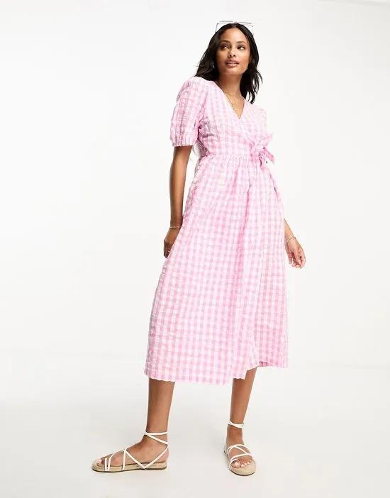 seersucker wrap midi dress in pink and white gingham