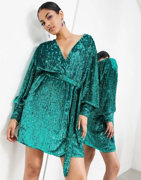 sequin wrap mini dress in teal green