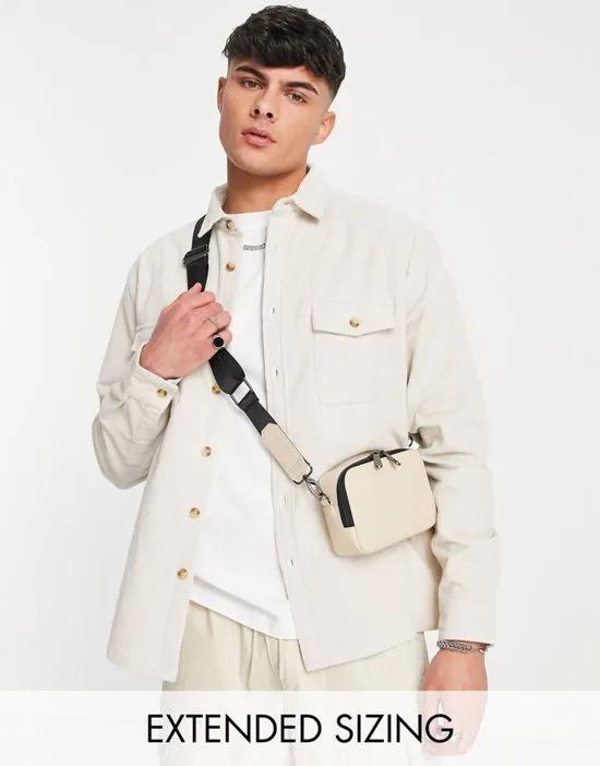 shacket in cream cord with double pockets