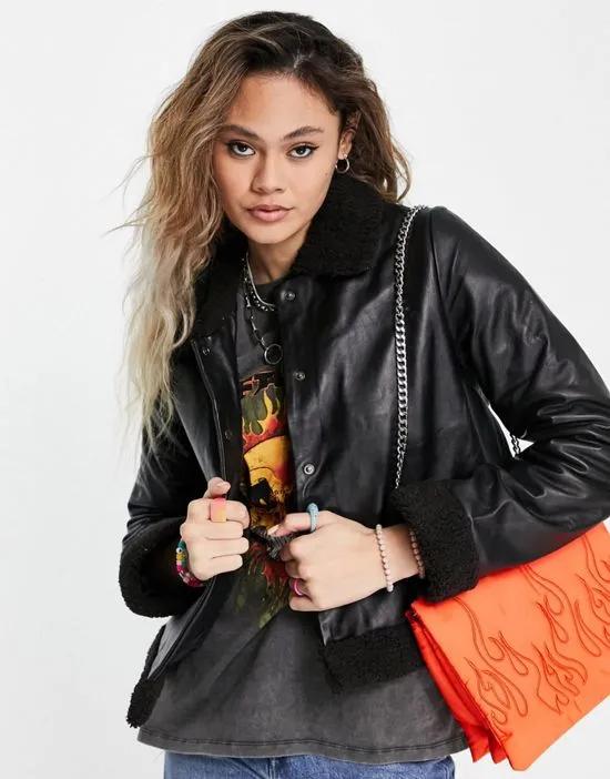 shearling trimmed leather jacket in black
