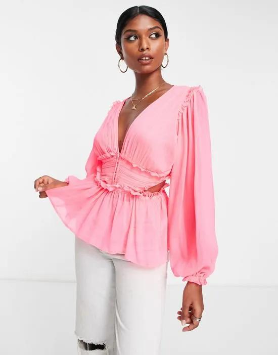 sheer blouse with pleated waist & cut out back in neon pink