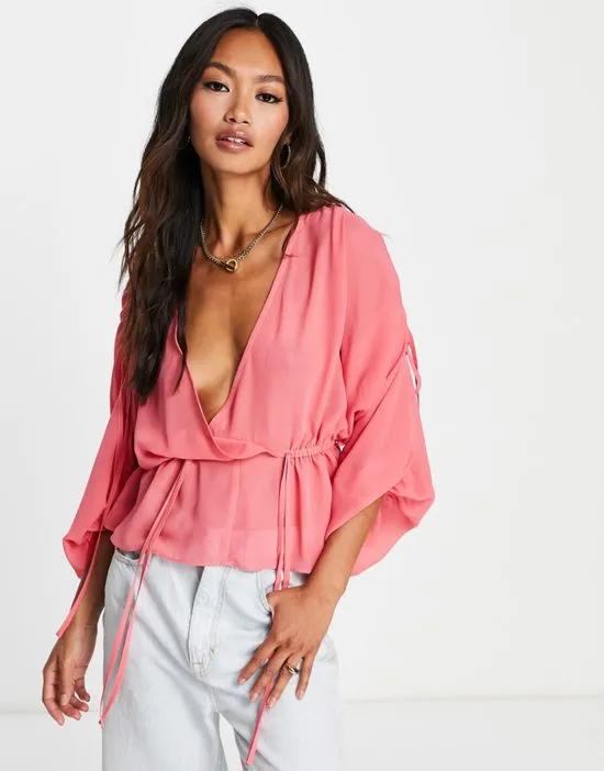 sheer ruched shoulder blouse with frill hem in pink