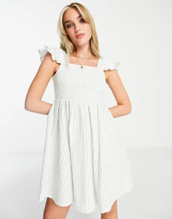 shirred bust frill sleeve mini swing dress in sage gingham