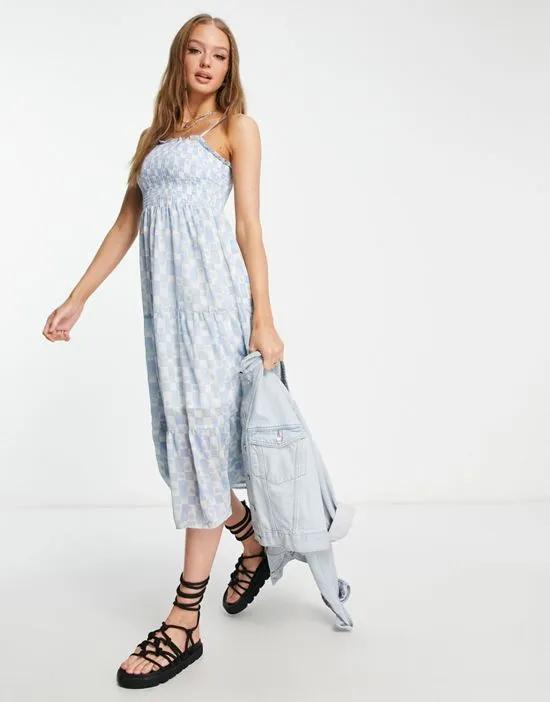 shirred bust tiered midi dress in plaid floral print