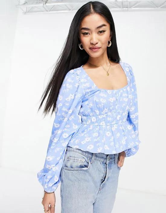 shirred waist long sleeve top in blue floral print