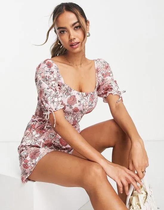 shirred waist puff sleeve romper in pink floral print