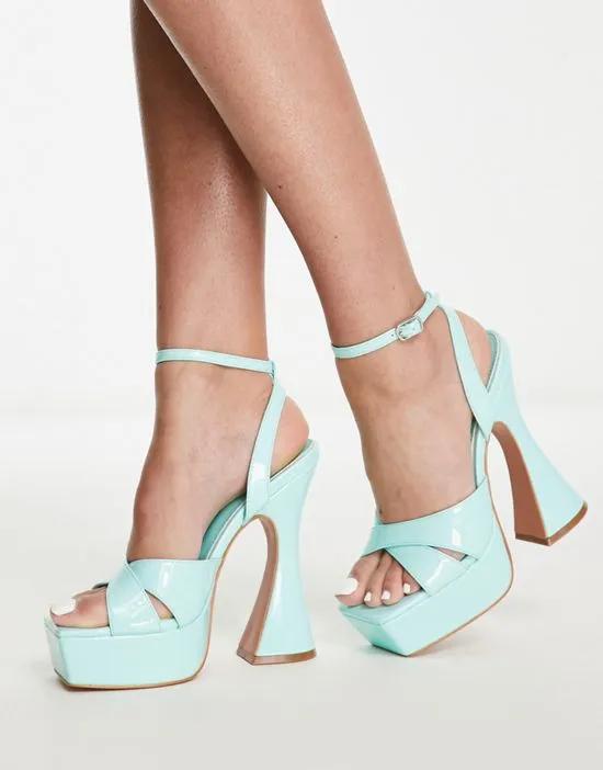 Simmi London Oceani platforms with flared heel in mint patent