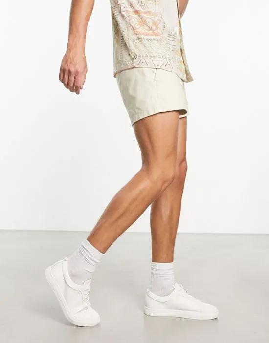 skinny chino shorts in beige in shorter length