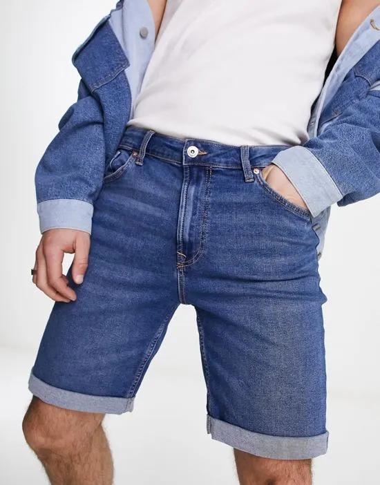 skinny denim roll up shorts in dark blue