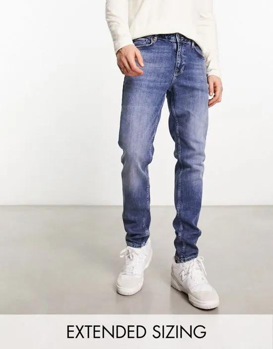 skinny jeans in Y2k mid wash blue