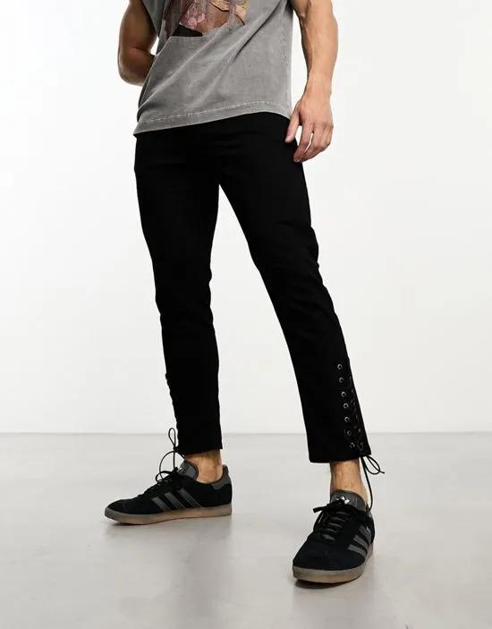 skinny jeans with hem ties in black