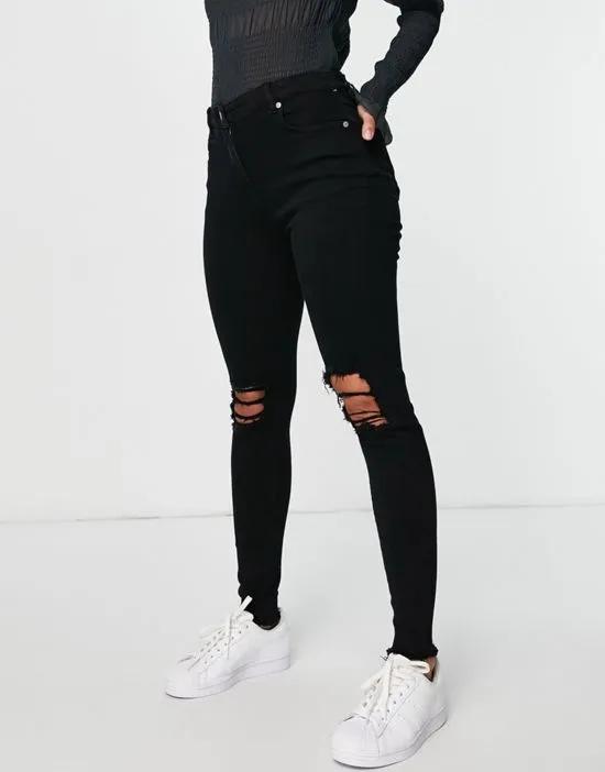 skinny jeans with ripped knee in black
