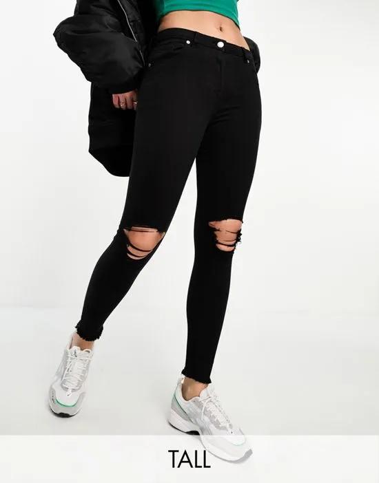 skinny jeans with ripped knee in black