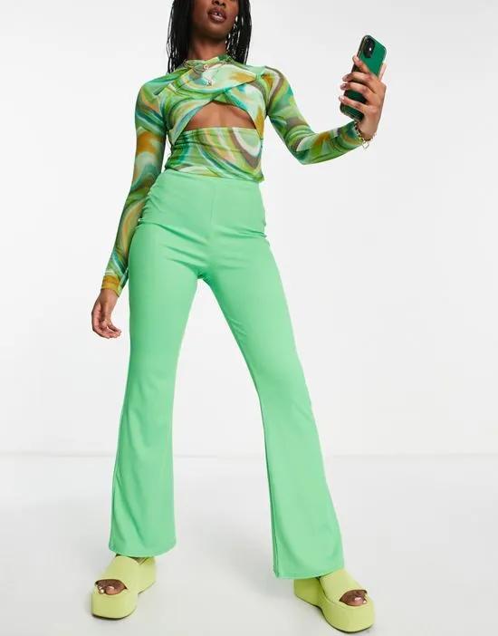 skinny ribbed flare in mid green pants