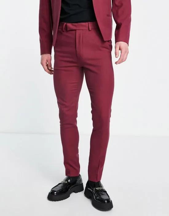 skinny single pleat suit pants in burgundy