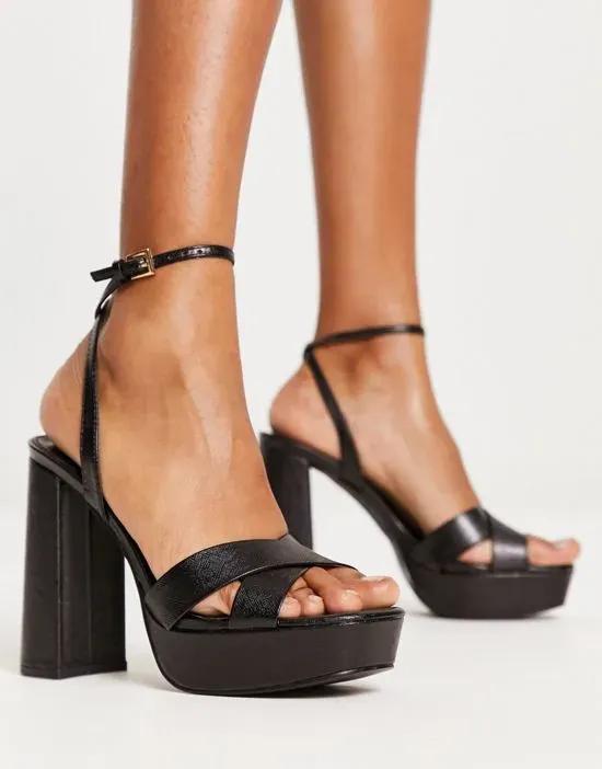 Skye platform heeled sandals in black