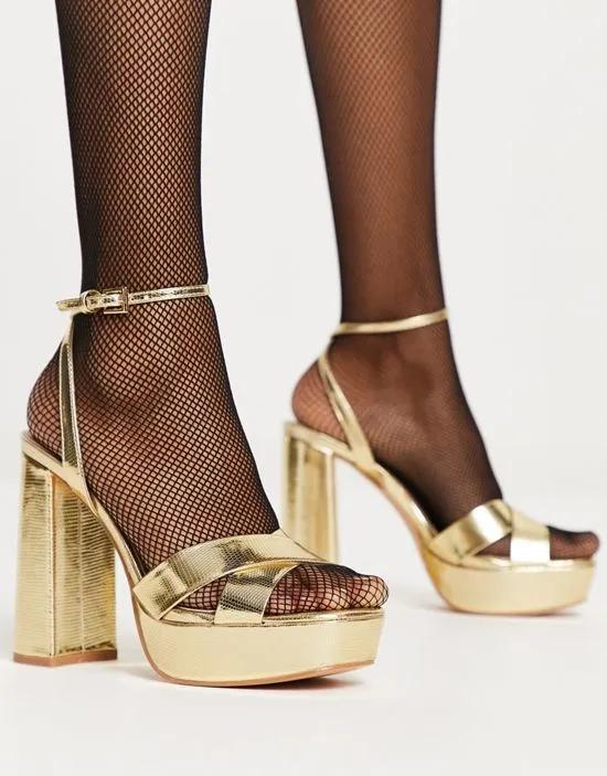 Skye platform heeled sandals in gold