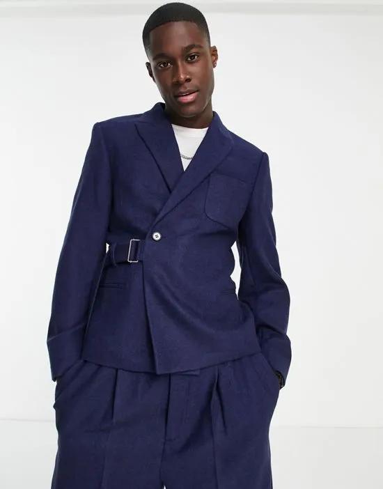 slim crop suit jacket in wool mix twill with utility strapping detail in navy