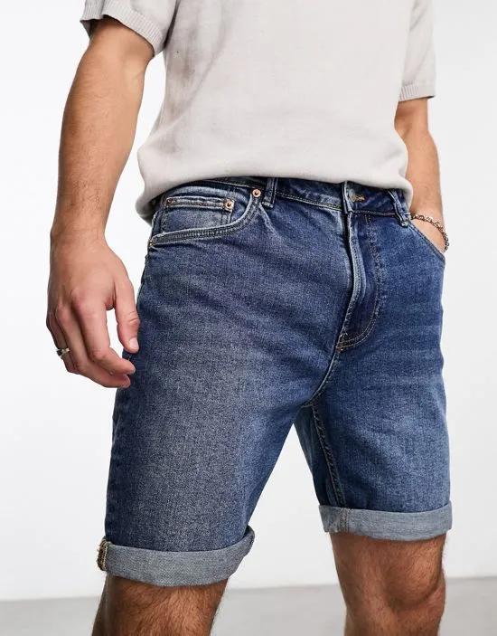 slim denim shorts in dark blue