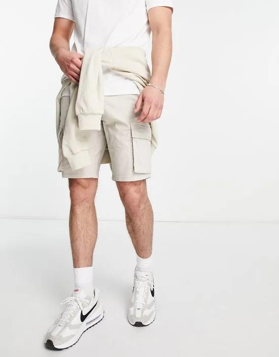 slim fit cargo shorts in beige